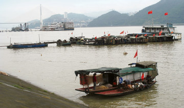 On China Yangtze river, giant dam’s legacy blocks revival