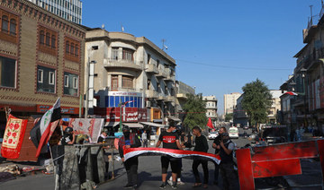 Iraqi protesters shut roads to ports, oil fields
