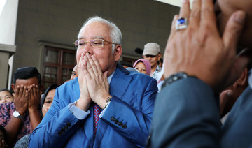 Malaysian ex-leader Najib takes stand in 1MDB trial
