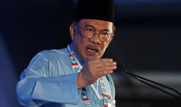 Malaysia’s ruling party makes fresh push for Anwar to take over as PM