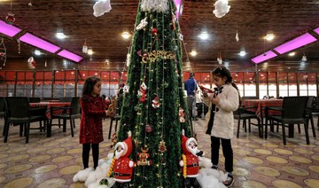 In Gaza, a somber Christmas after permits row