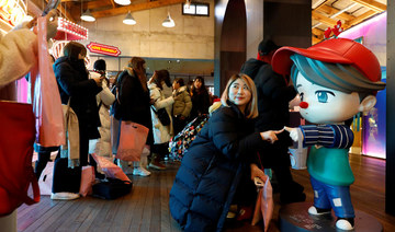 K-pop fans brave Seoul’s Christmas chill to buy BTS ‘merch’