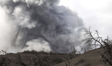 Philippine volcano’s quakes, cracks send more people fleeing