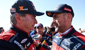 Spanish driver Carlos Sainz takes third Dakar Rally title after winning Saudi edition 