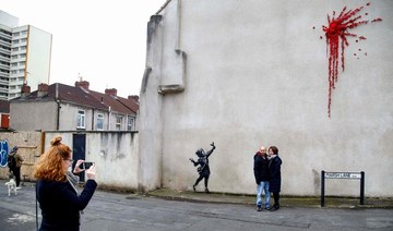Banksy’s Valentine’s Day mural covered after it was defaced