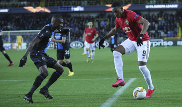 Martial grabs key goal as Man Utd draw in Bruges