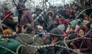 Migrants clash with Greek police at border after Turkey opens floodgates