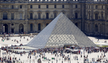 Virus spreads to over 60 countries; France closes the Louvre