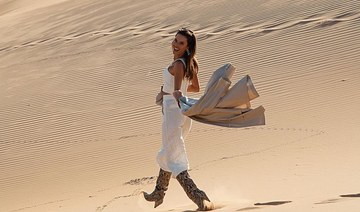 Brazilian models Alessandra Ambrosio and Izabel Goulart hit the dunes in Abu Dhabi