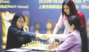 Controversy over loose-fitting hijab forces Iranian chess referee to claim asylum in UK