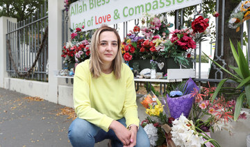 Flowers and messages of support adorn NZ mosque for shooting anniversary