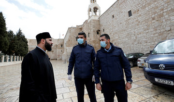 Palestinians suspend prayers at mosques, churches to fight coronavirus