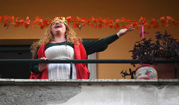 Italians sing out from balconies during coronavirus lockdown