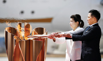 Crowds form at Olympic torch event in Japan despite virus caution