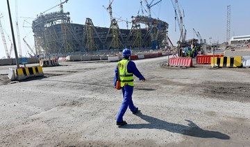 As world locks down, Qatari construction presses ahead