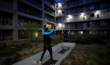 Beating lockdown inertia: French city-dwellers keep fit on balconies