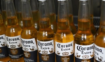 Mexican brewer of Corona beer producer halts production over virus
