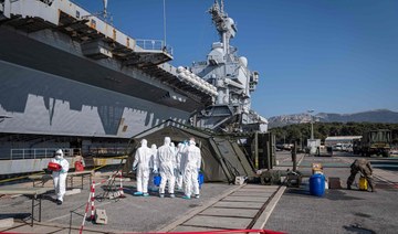 France defends handling of aircraft carrier coronavirus outbreak