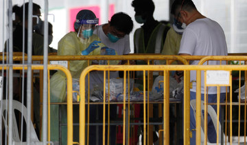Singapore confirms record jump of 1,426 coronavirus cases