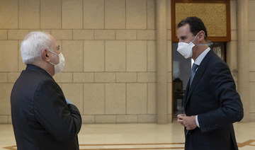 Wearing face masks, Syria’s Assad and Iran’s Zarif condemn West at Damascus meeting