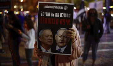 Thousands protest Israel coalition deal on eve of court date