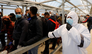 Palestinian laborers back working in Israel as virus slows