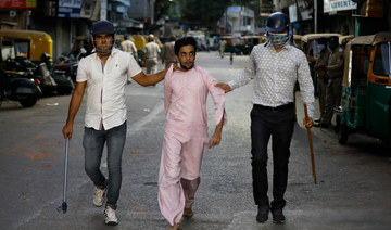Police clash with crowds in Indian city after stricter lockdown