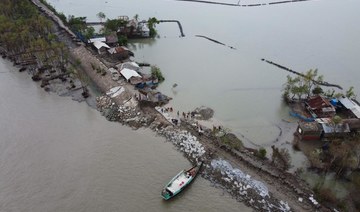 Cyclone toll hits 84 as Bangladesh and India start mopping up