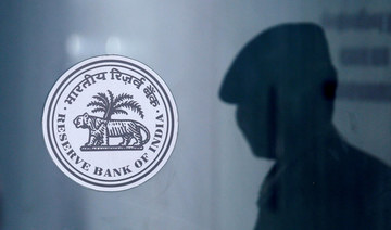 India central bank slashes rates, warns of contraction