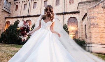 Actress Debby Ryan got secretly married wearing an Elie Saab wedding gown 