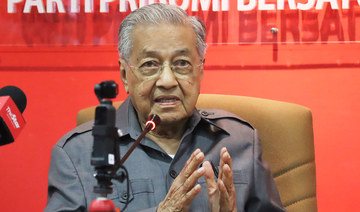 Malaysia’s former PM vows to challenge expulsion from ruling political party