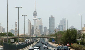 Kuwait vows to cut migrant population to 30%