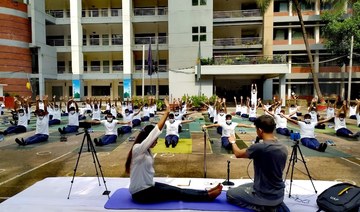 Bangladesh police turn to yoga to boost mental health in battle against coronavirus
