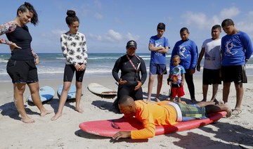 Arab Israeli surfer keeps hopes alive at last Arab village on Israel’s Mediterranean coast