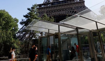 Eiffel Tower reopens after a three-month coronavirus break