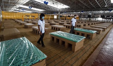 India turns to cardboard beds in coronavirus battle