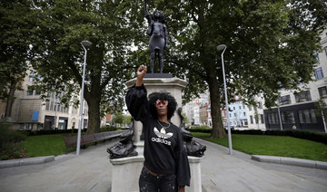 Toppled slave trader’s statue replaced by Black protester in England