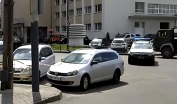 Armed man holding some 20 people hostage in Ukraine