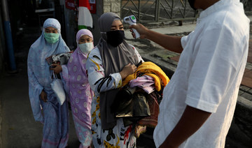 Indonesia reports 1,560 new coronavirus cases, 62 deaths