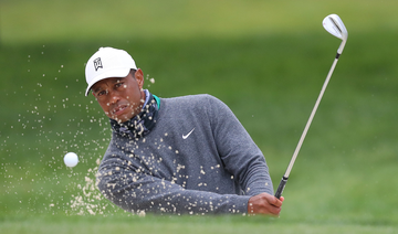Woods ready for leap into unknown at fan-free major