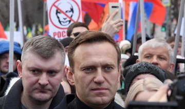 Kremlin critic Navalny hospitalized with poisoning