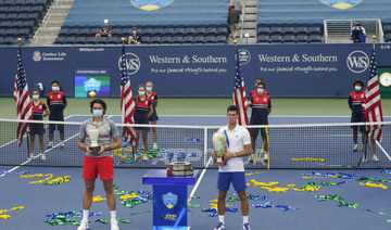 Djokovic rallies past Raonic to win US Open tuneup title