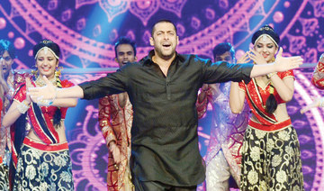 Bollywood back on track but virus precautions wipe out iconic dance scenes 