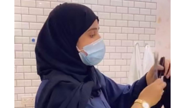 Saudi woman barber brushes off taboo