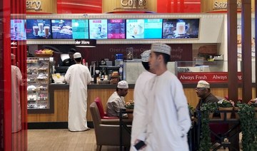 Oman tells shoppers to cover knees and shoulders in malls or face jail