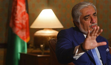 Afghan top peace envoy pushes Pakistan to press Taliban to lessen violence