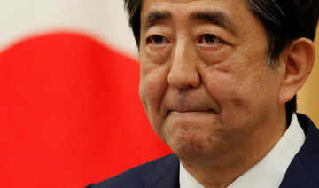 Japan prosecutors seek to question ex-PM Shinzo Abe on spending scandal