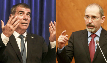 This combination of pictures created on December 4, 2020 shows a file photo taken on June 10, 2020 of Israel's Foreign Minister Gabi Ashkenazi (L) during a press conference in Jerusalem and another one dated January 13, 2020 of his Jordanian counterpart Ayman Safadi at a news conference in Jordan's capital Amman. (AFP)