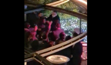 Lebanese social media users have reacted angrily to a video appearing to show Ahmad Hariri’s security personnel hitting people in a Beirut restaurant. (Screenshot/Twitter: @DalalMawad)