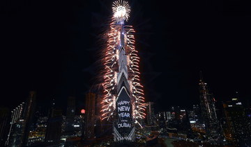 Fireworks explode from the Burj Khalifa, the tallest building in the world, during New Year's Eve celebrations in Dubai, United Arab Emirates, December 31, 2020. (Reuters)